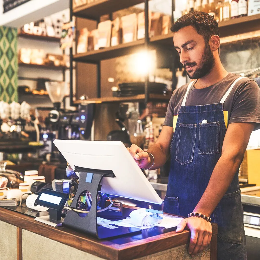 Restaurant employee at register