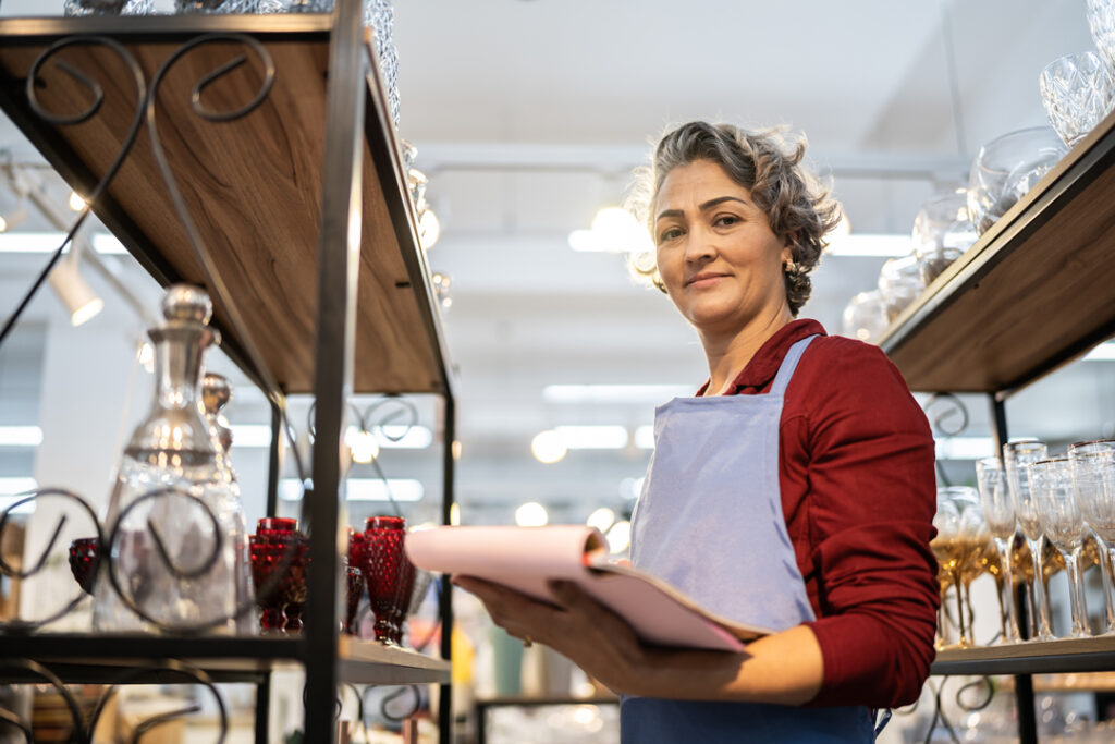 Happy Business Owner Looking at Camera