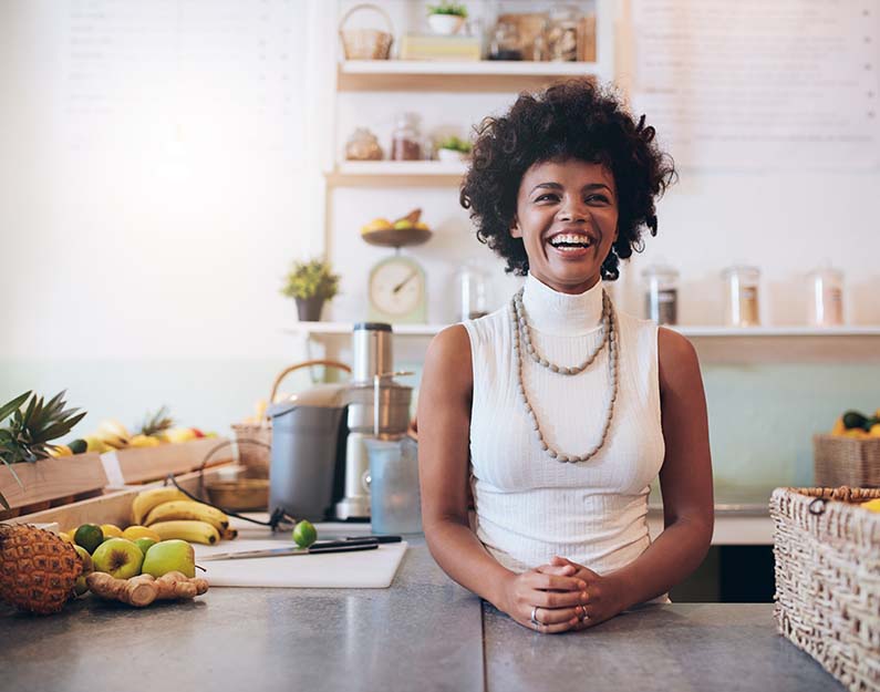 Photo of happy restaurant owner