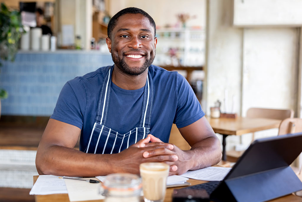 Happy restaurant owner