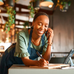 woman employee writing a sales order