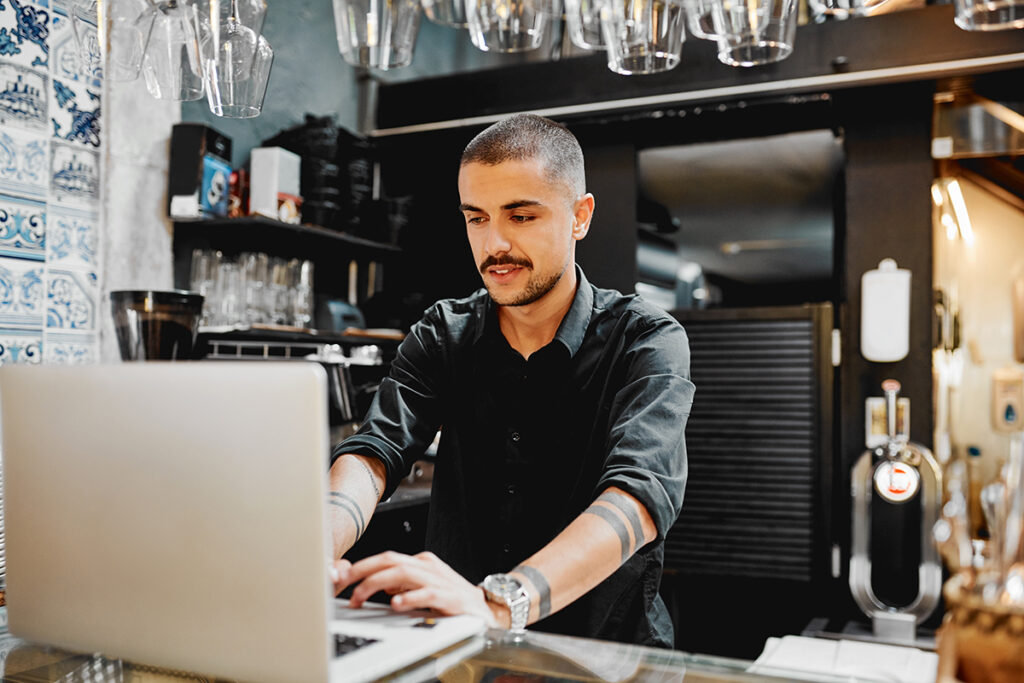 business owner at computer