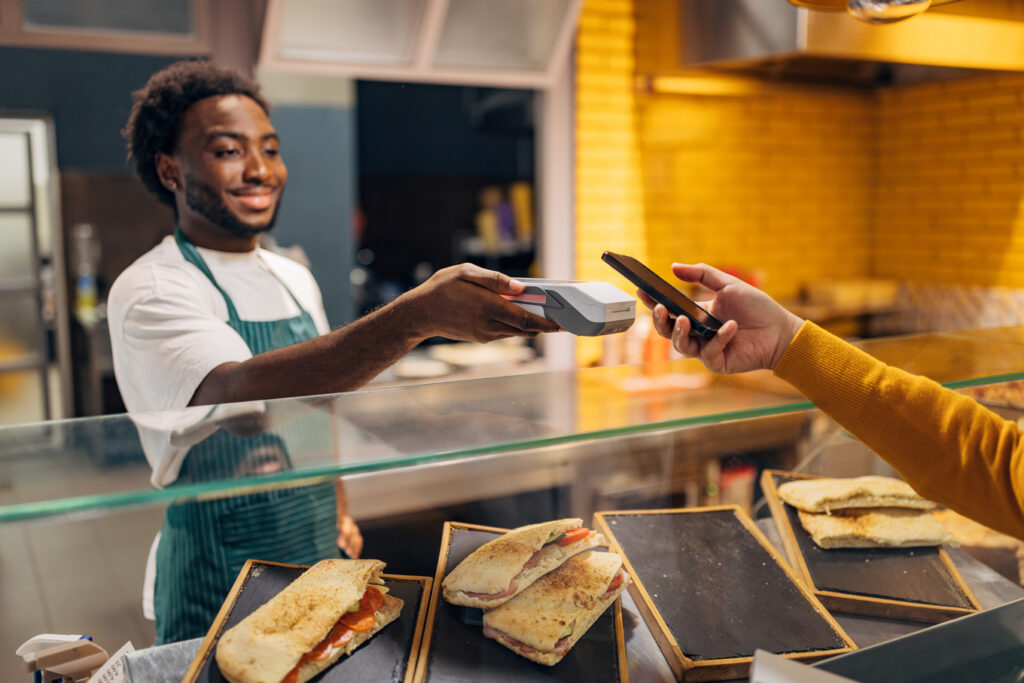 Toast IQ. Helping  a customer complete a transaction